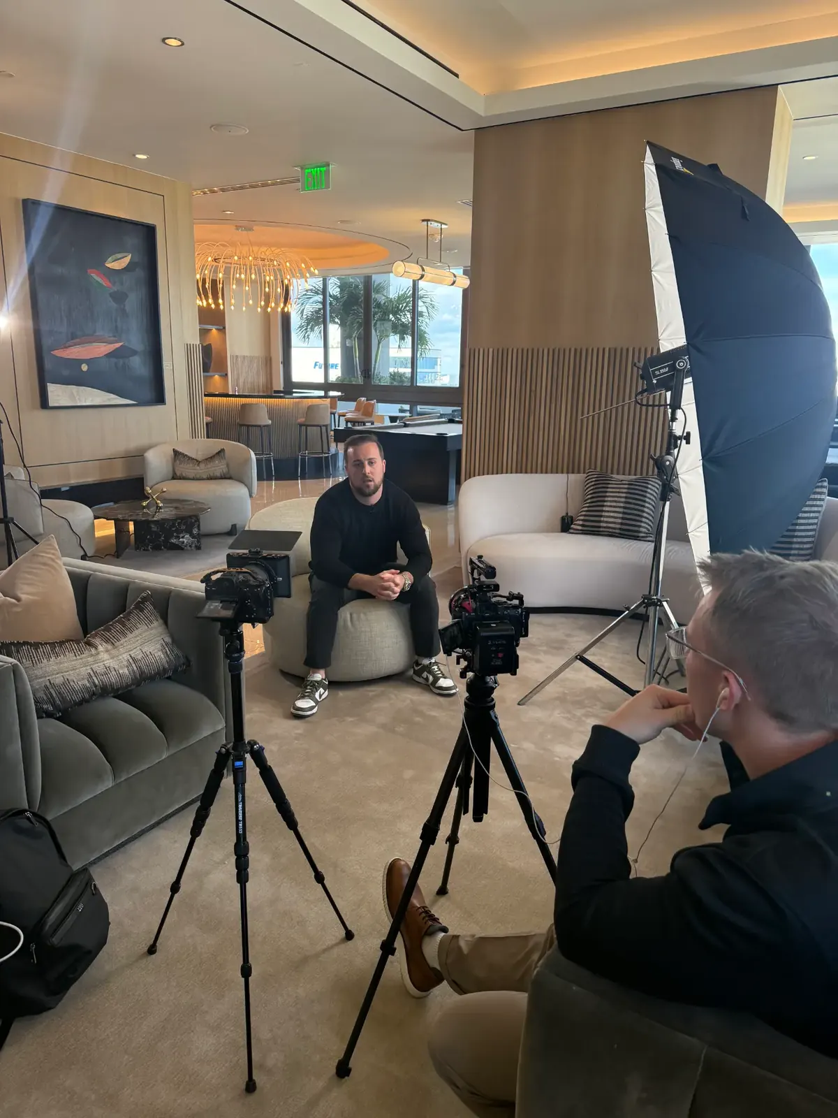 Interview recording session with cameras and lighting